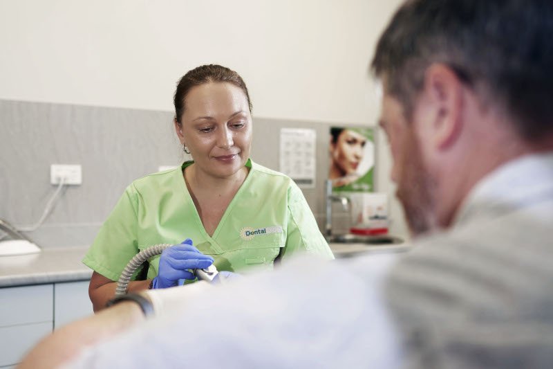 Wurtulla Dentist at work with caring support staff